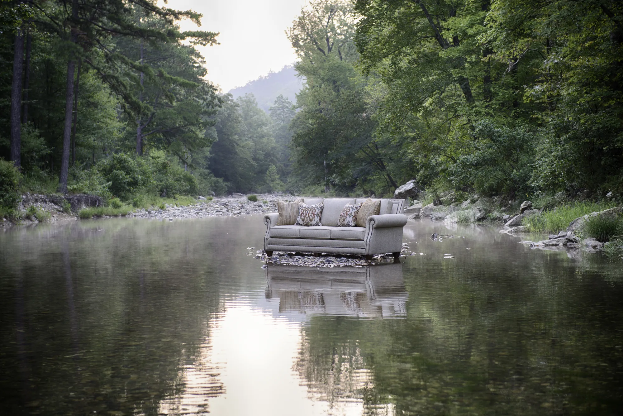 9000 sofa in Runaround Beige fabric, by a creek